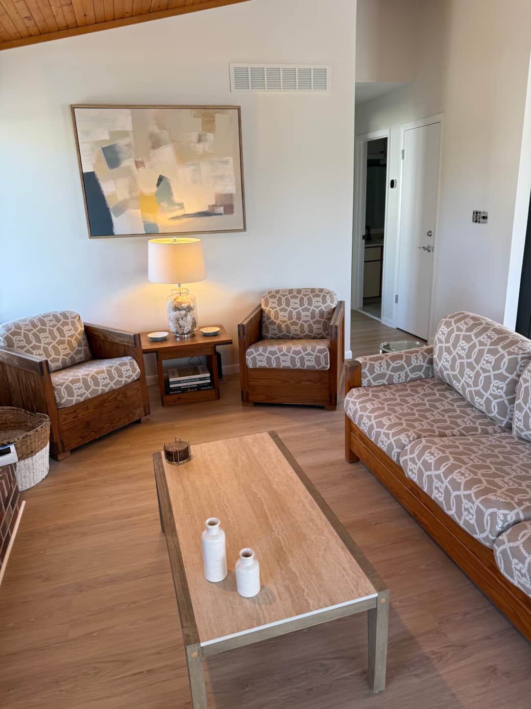 The Great Room combining the kitchen & living room. New 65" TV,  new paint & flooring