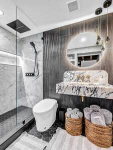 Solid marble sink imported from Turkey and hand-made lacquered brass faucet from Morocco