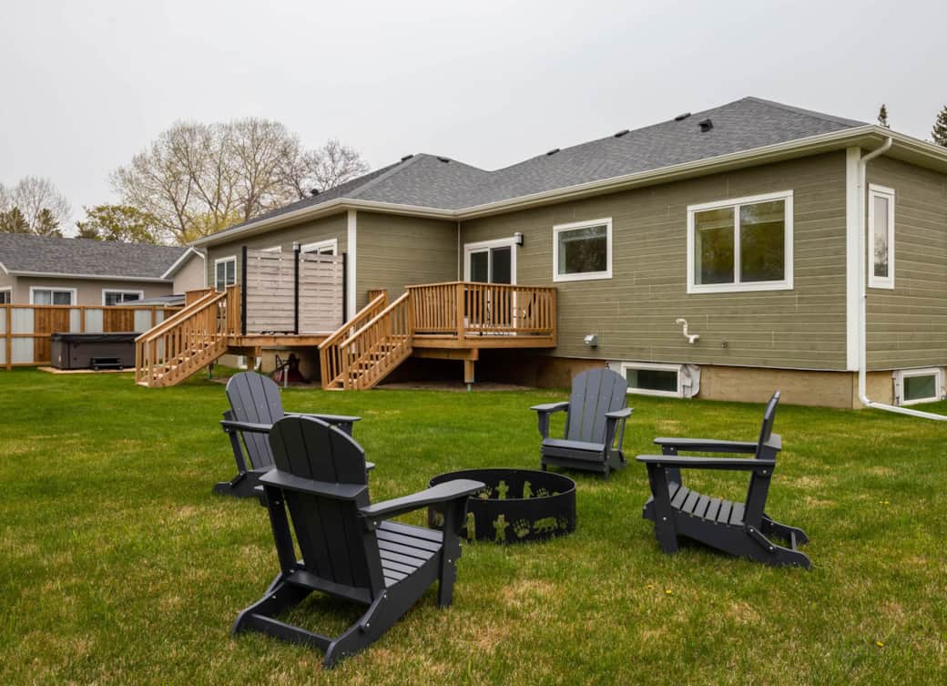 Comfy adirondack chairs for enjoying an evening fire