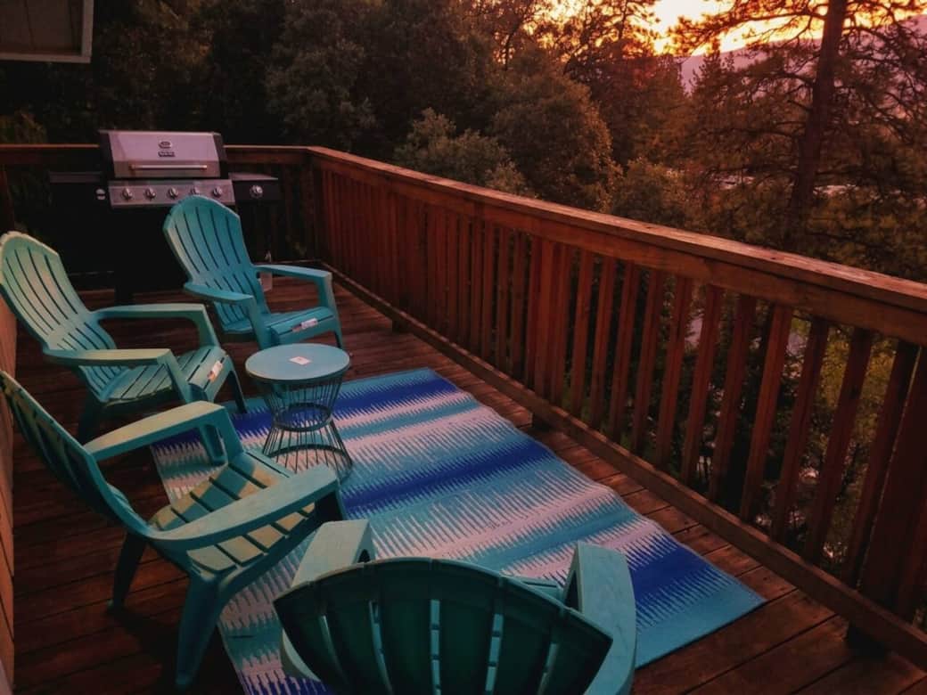 Spacious deck with seating and BBQ grill — fire up the grill, pour some wine, and dine al fresco at sunset