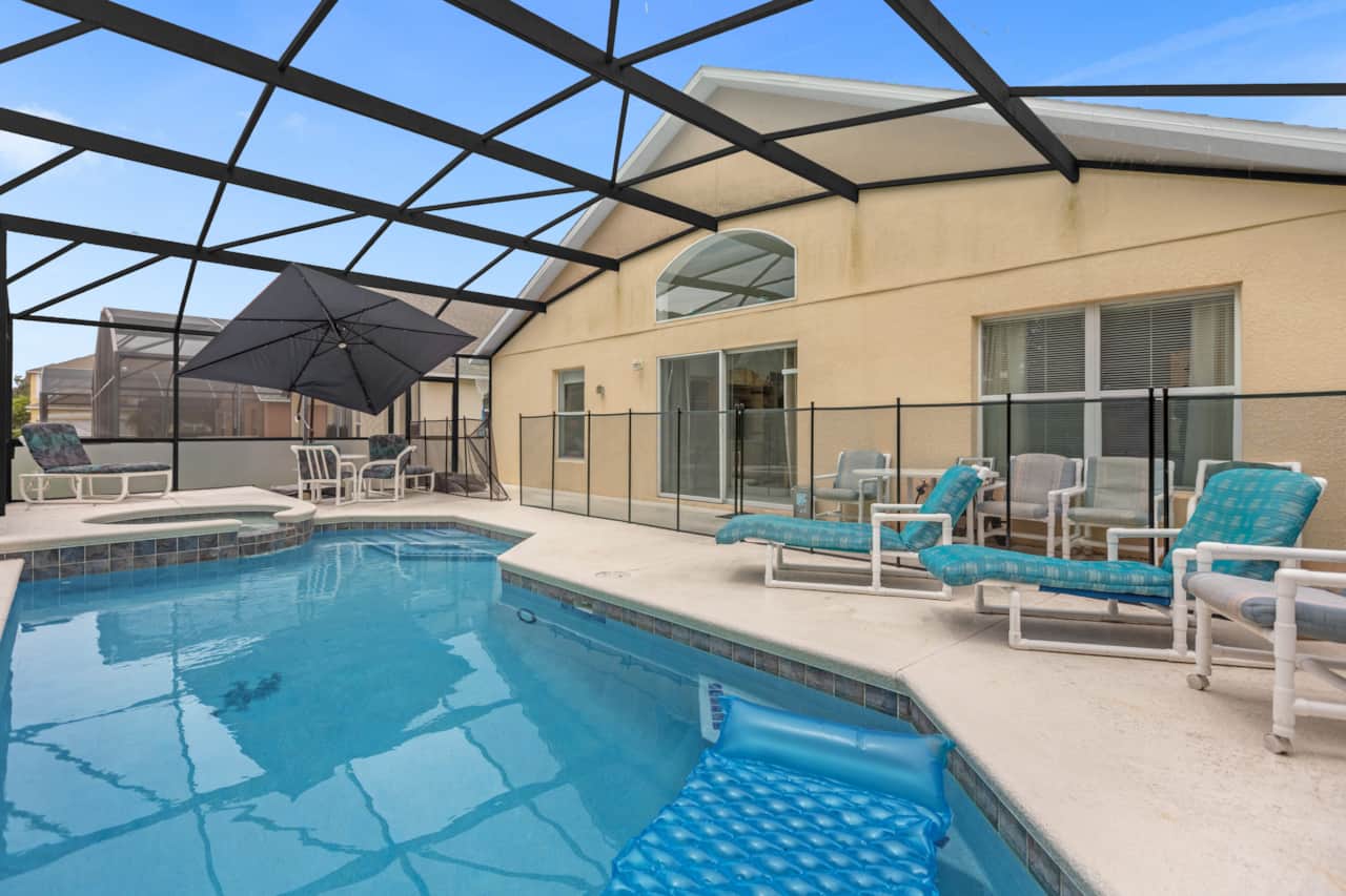 An inviting pool and deck space with plenty of seating
