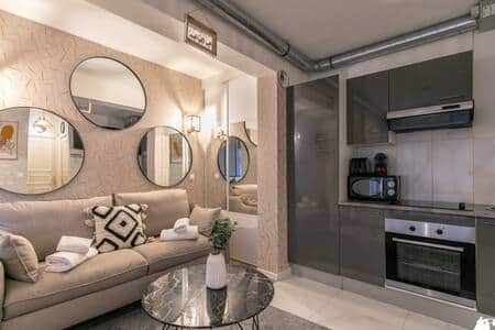 Salon avec cuisine équipée Salon avec cuisine équipée