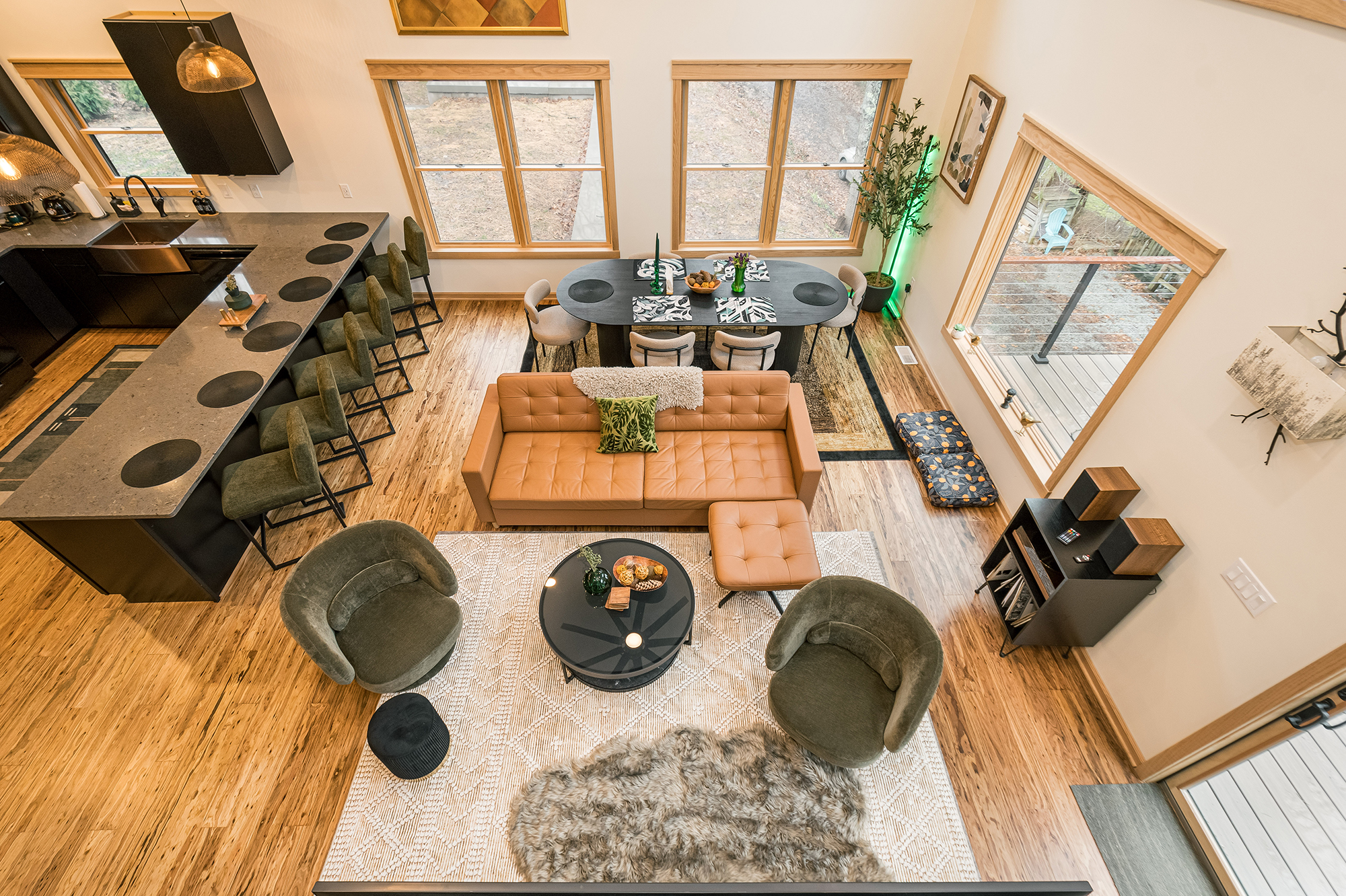 Open-plan living room, dining table and kitchen seen from above