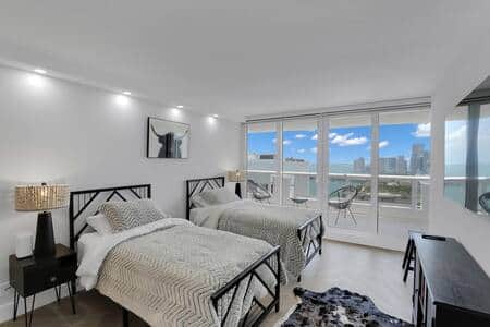 2nd bedroom, two twin beds, streaming tv, balcony access