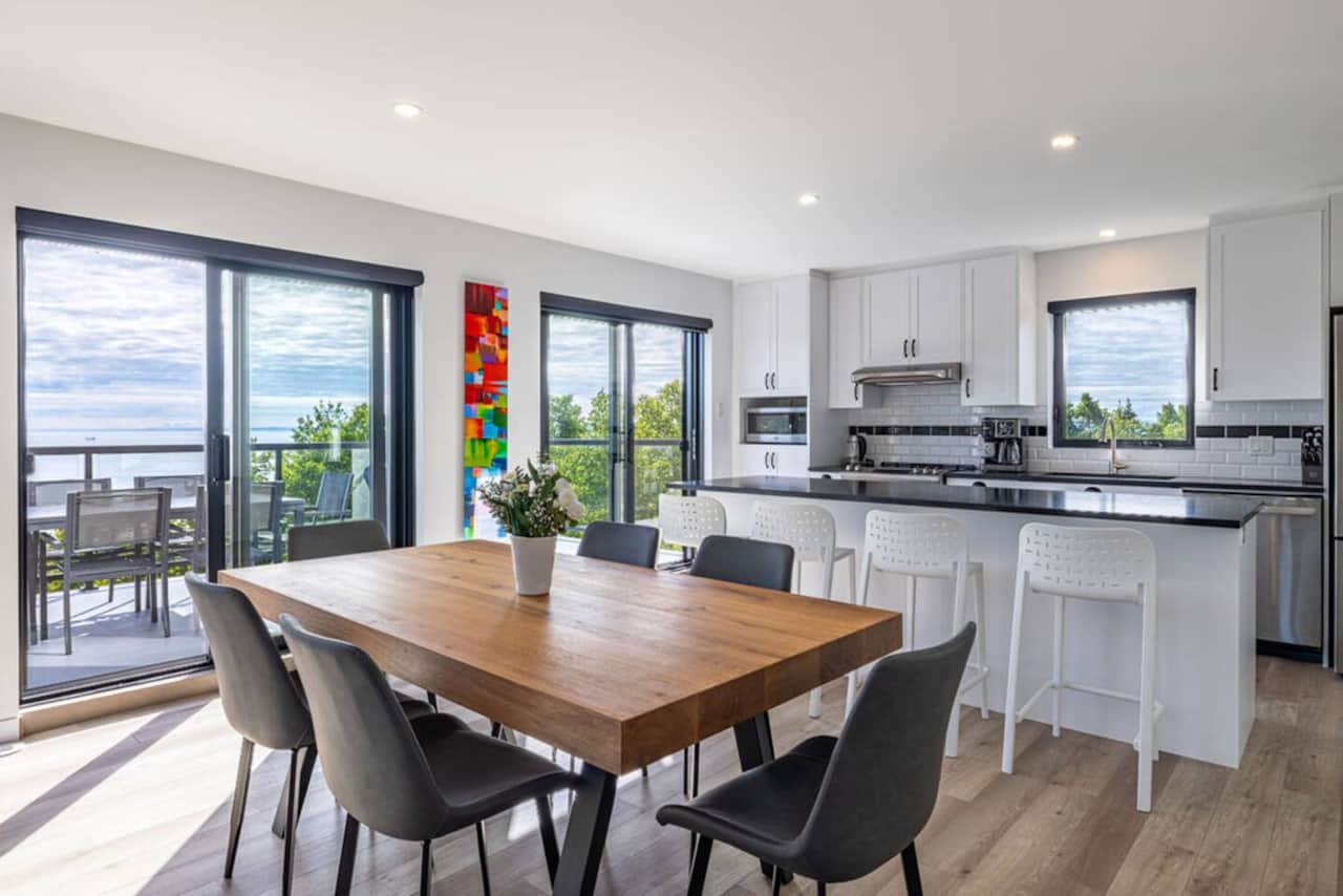 Dining room, kitchen and view