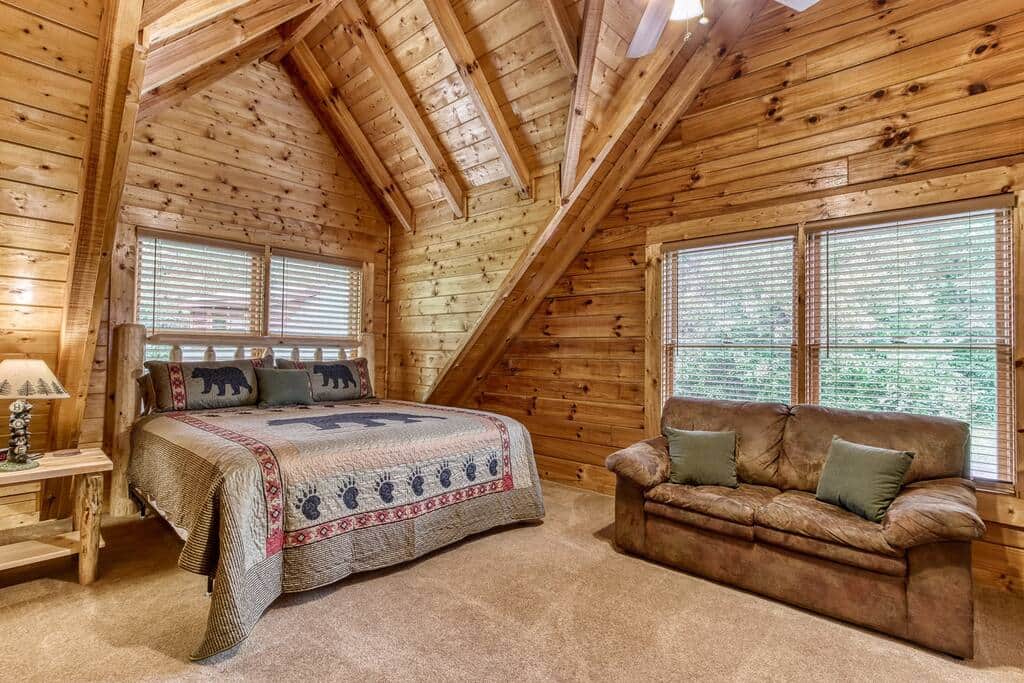 Upstairs master bedroom with twin sleeper sofa and king size bed. Upstairs master bedroom with twin sleeper sofa and king size bed.