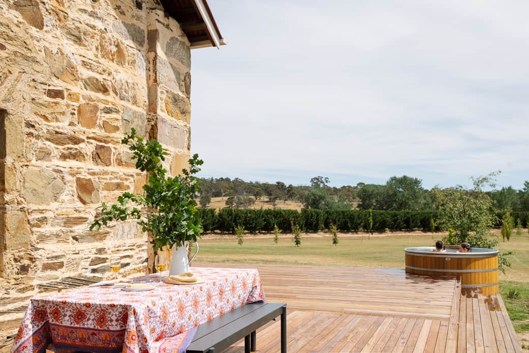 Outdoor dining space and Spa at the rear of Apartment A