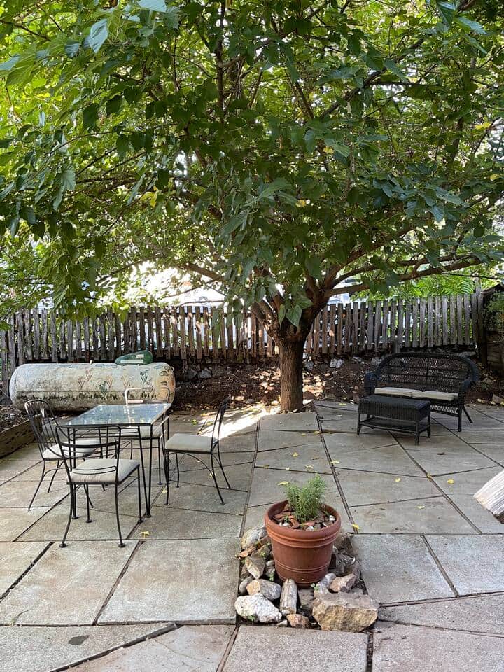 Enjoy a peaceful retreat in the quiet backyard, where you can BBQ under the shade of a large tree. This serene outdoor space is perfect for grilling, dining al fresco, or simply relaxing in the shade, offering a perfect escape during your stay.