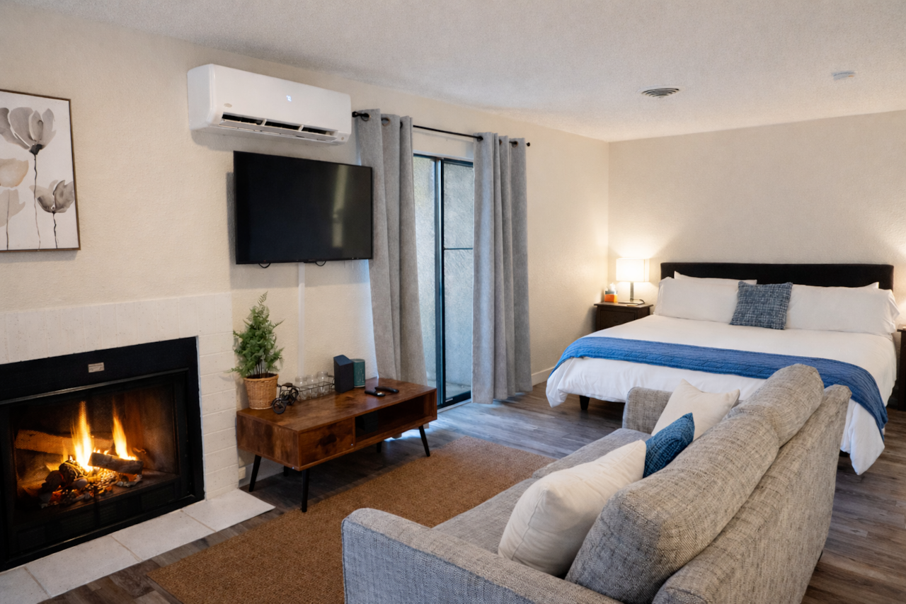 Snuggle up by the real fireplace! Just bring your own firewood and you’re all set.