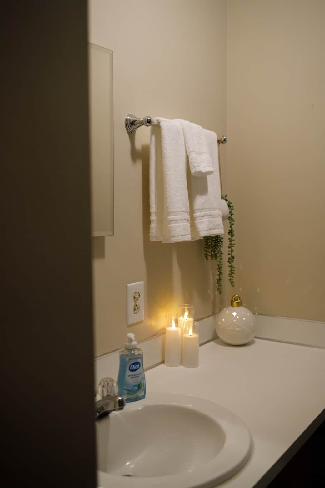 Charming half bath offering convenience for guests.