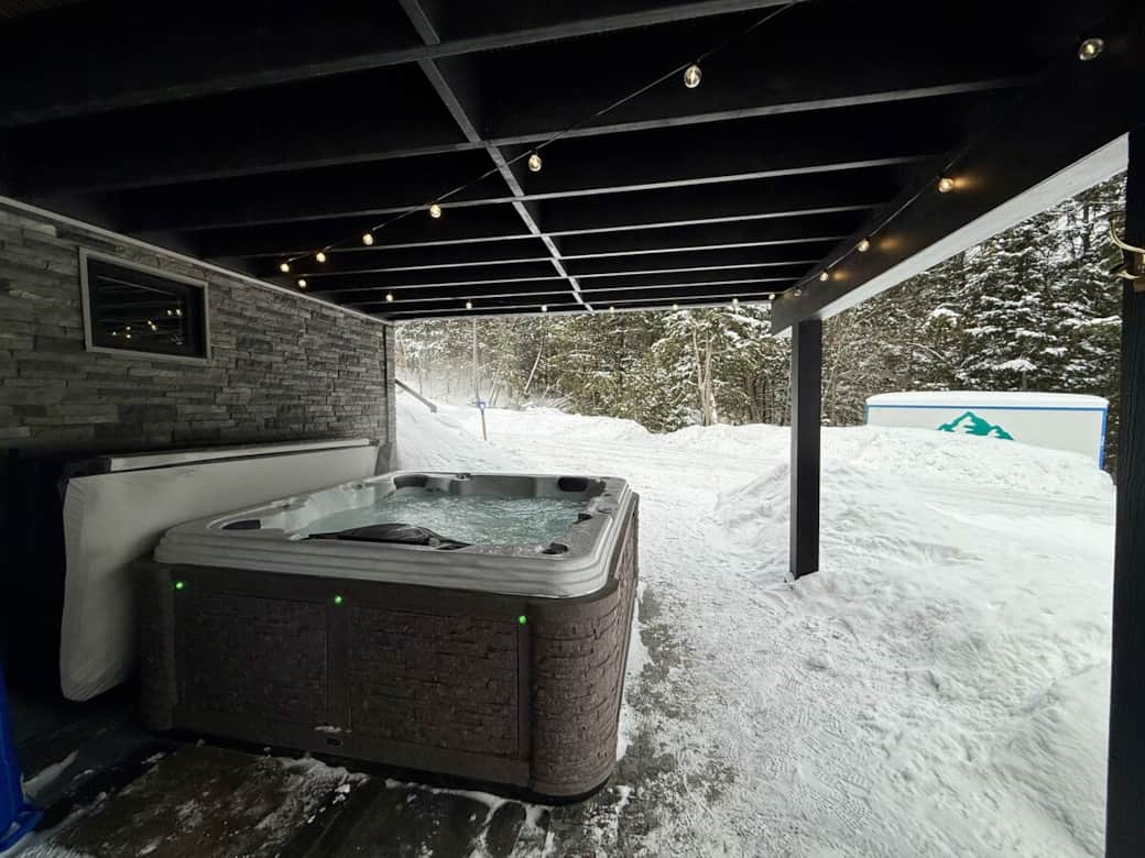 Shared hot tub under deck at A-frame