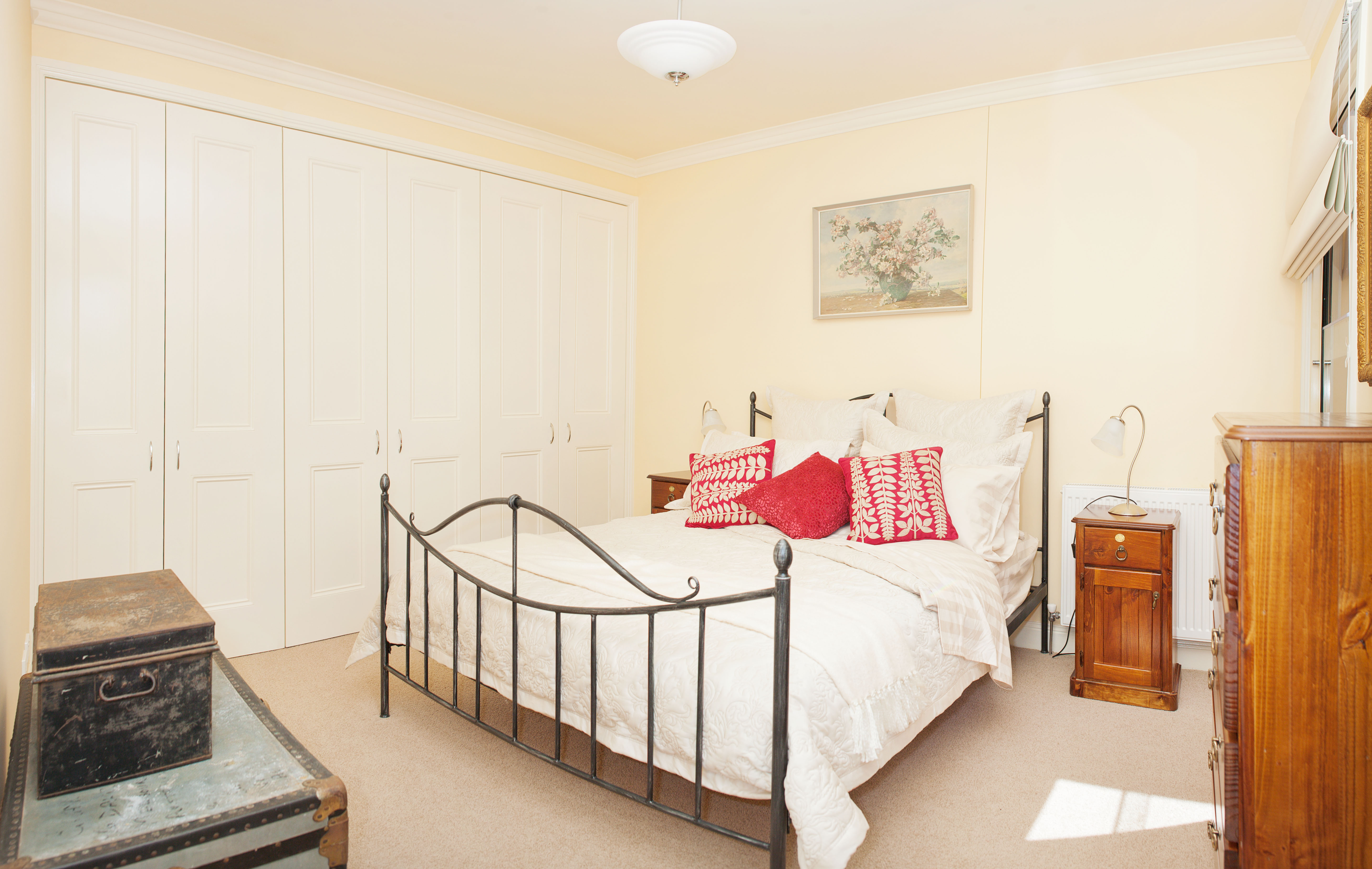 Beautiful queen size bed with luxury linen. 