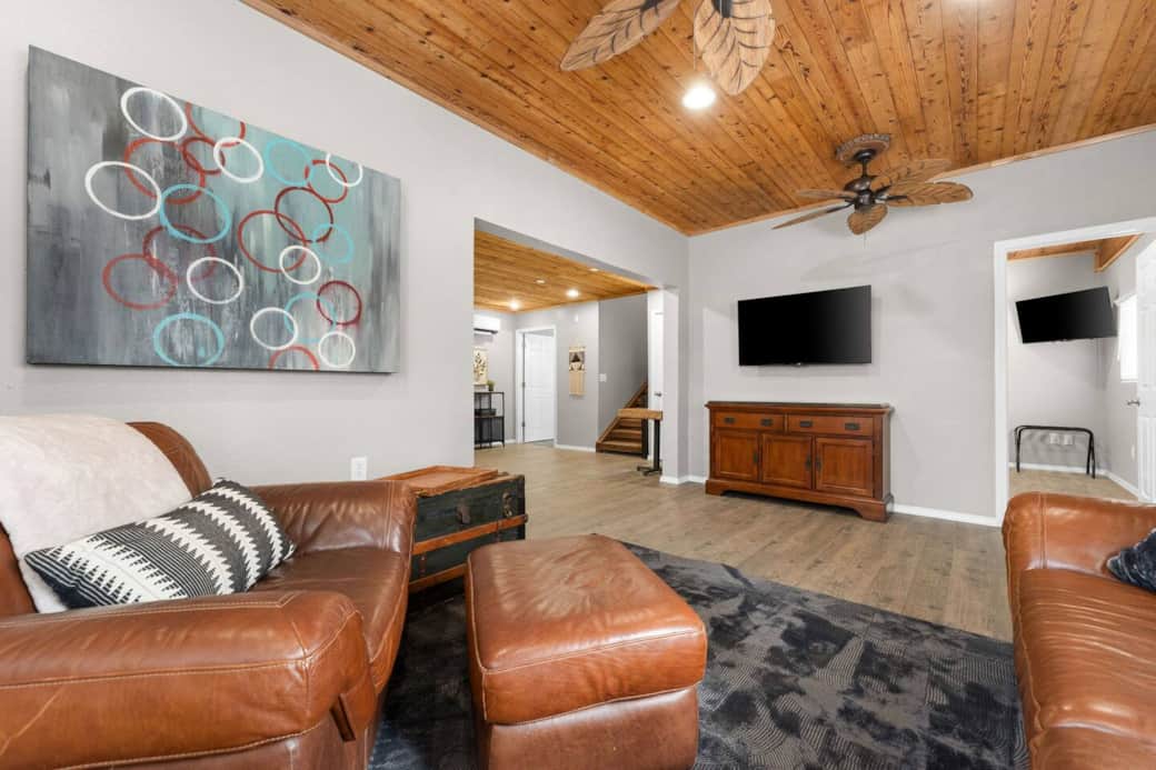 Spacious living room with tv.