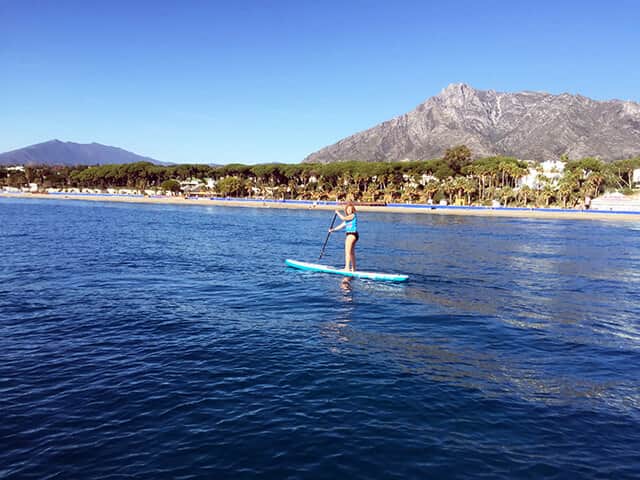Swim, sail, paddle — Marbella's calm bay keeps the water sports going almost all year
