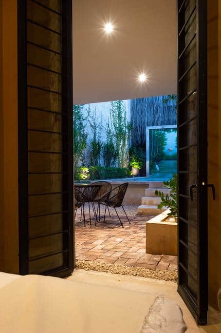 Door from downstairs bedroom to pool