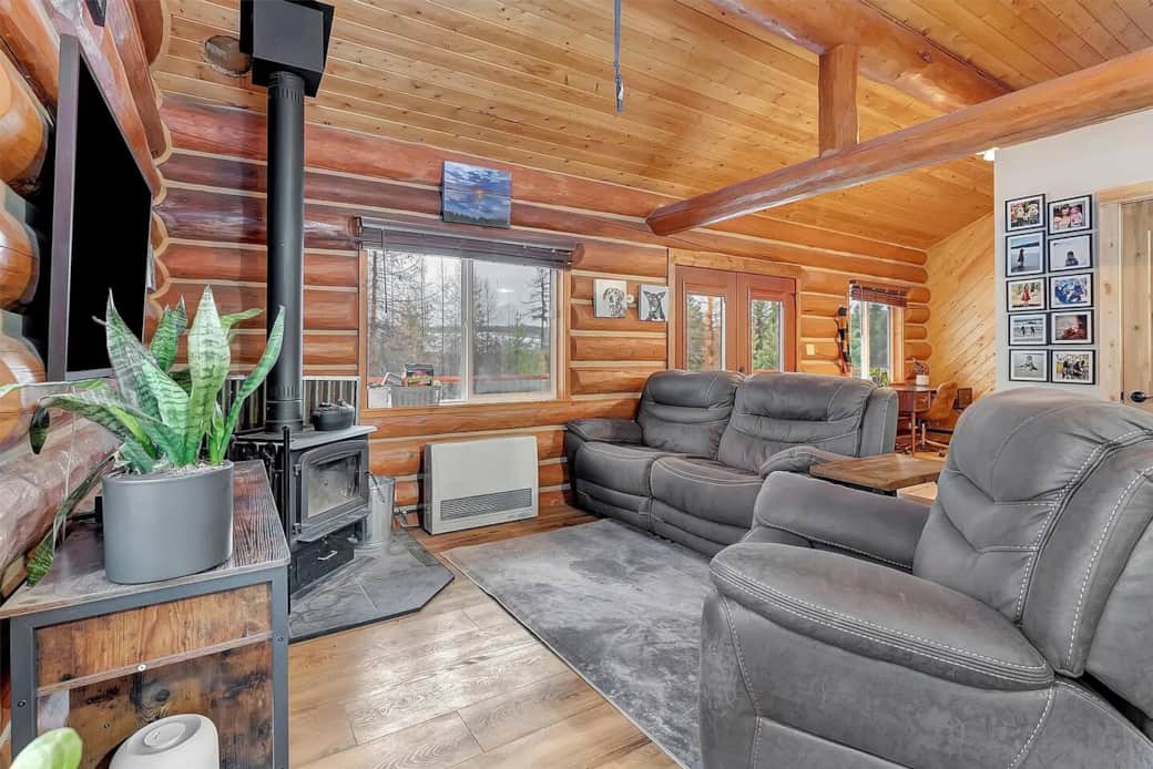 Cozy upstairs living room with wood stove Cozy upstairs living room with wood stove