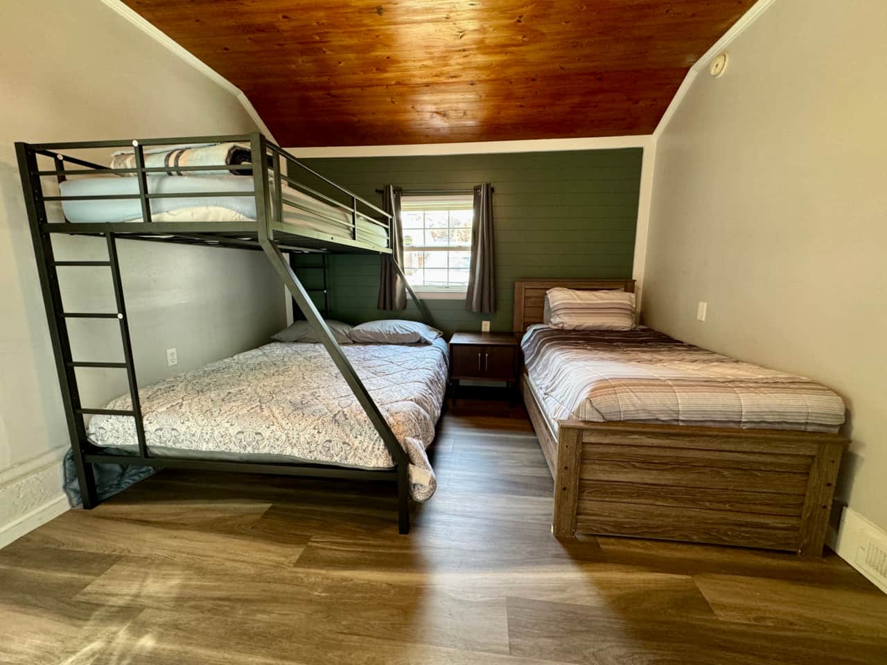 3rd bedroom with queen/twin above, and another twin bed