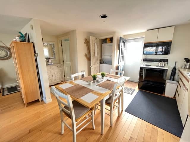 Kitchen area with stacked W/D