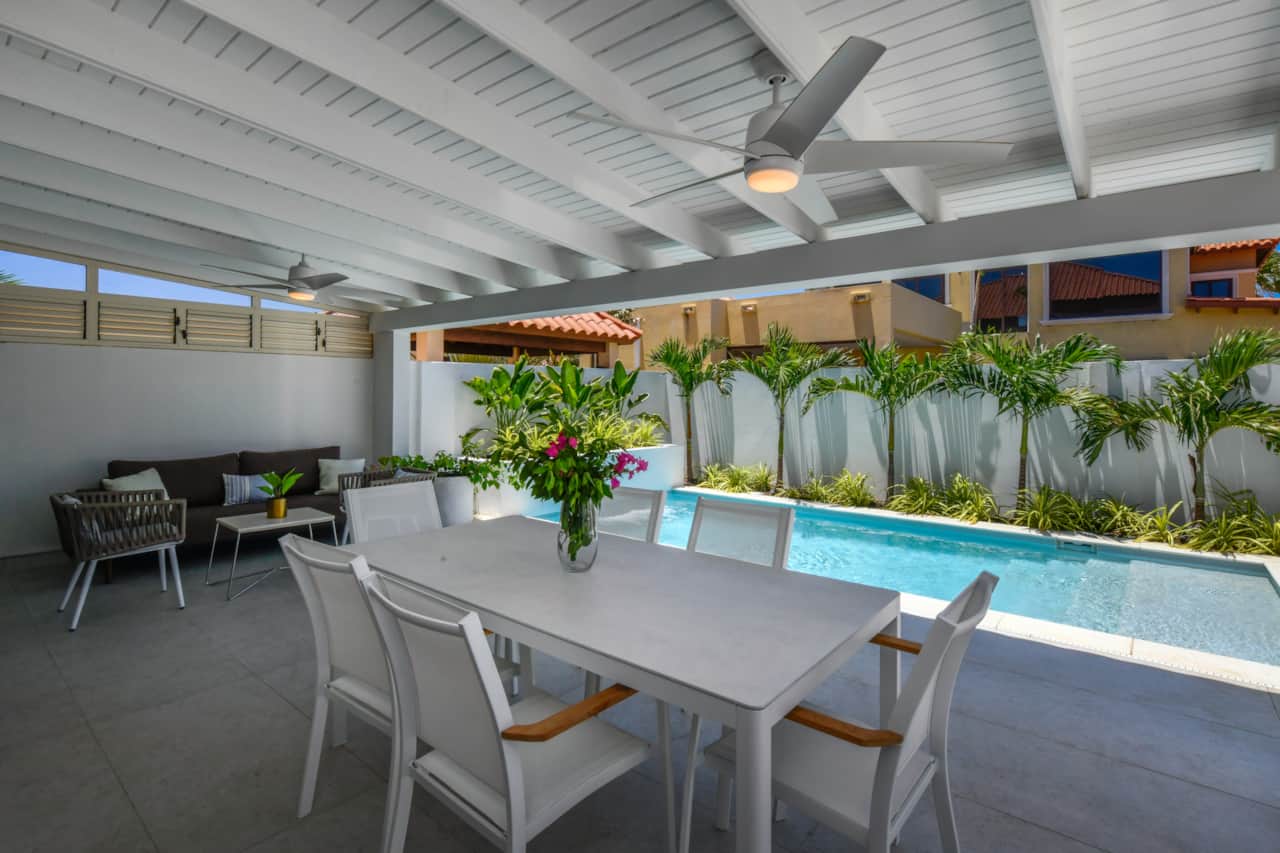 Private backyard with dining table seating for 6