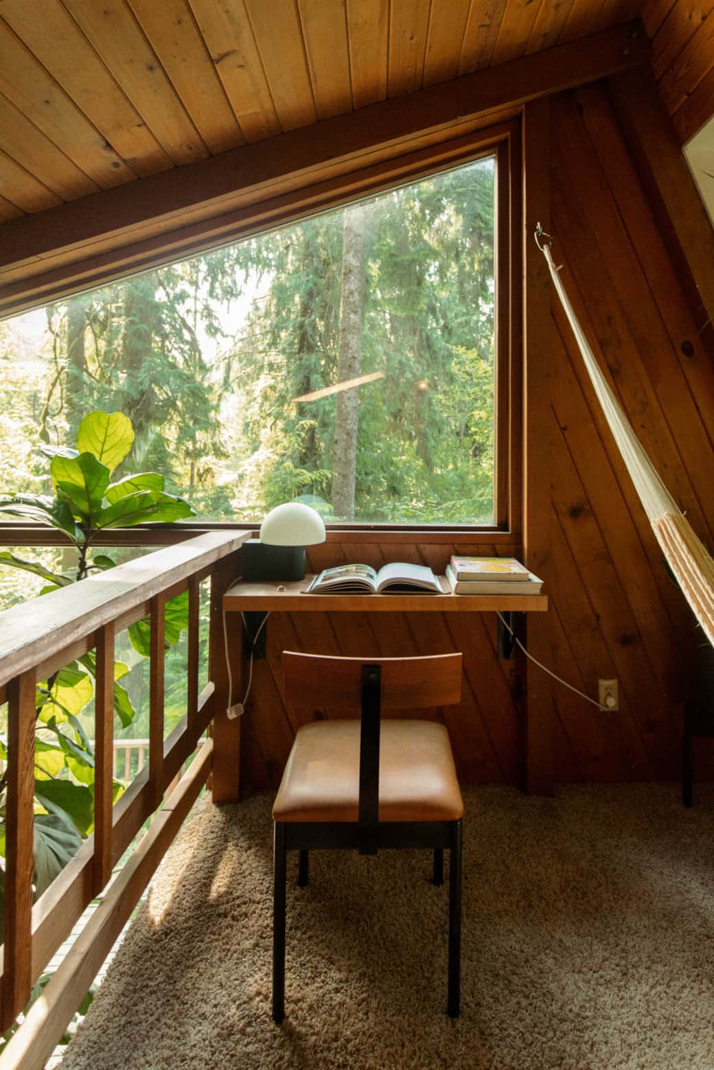 Writing desk and hammock in the loft Writing desk and hammock in the loft