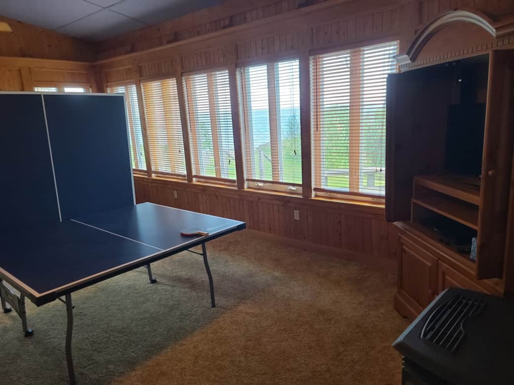 Game room includes ping pong table and lots of games!