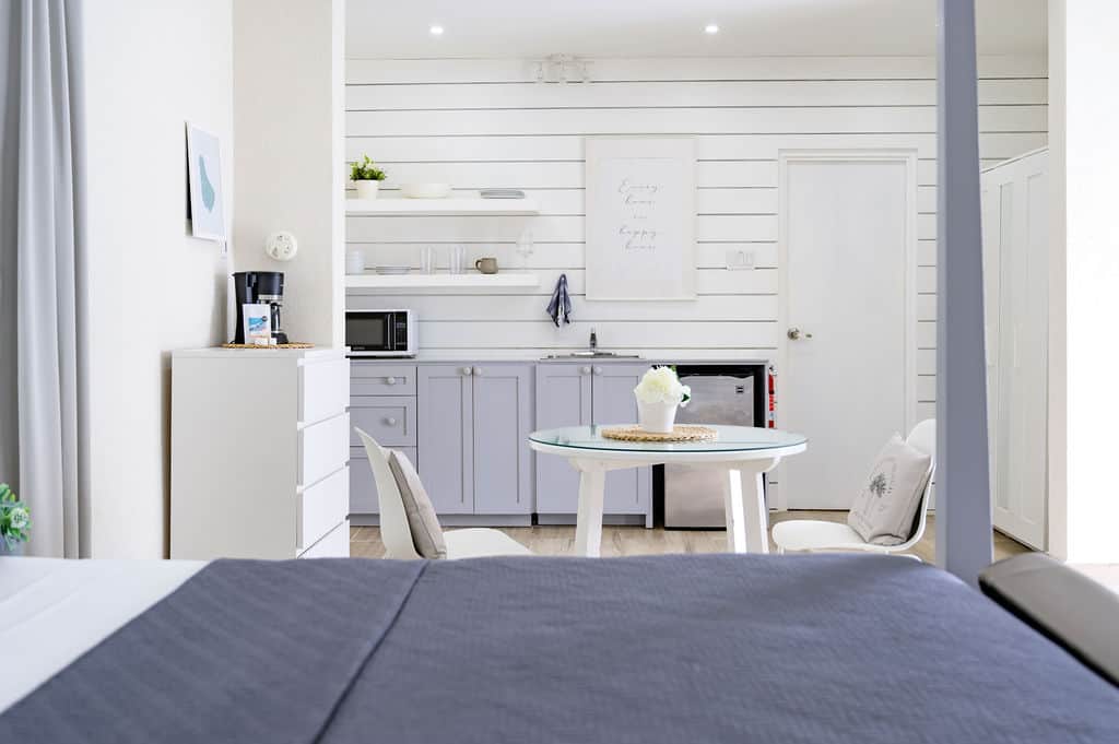 Coastal Charm: Nautical touches throughout.