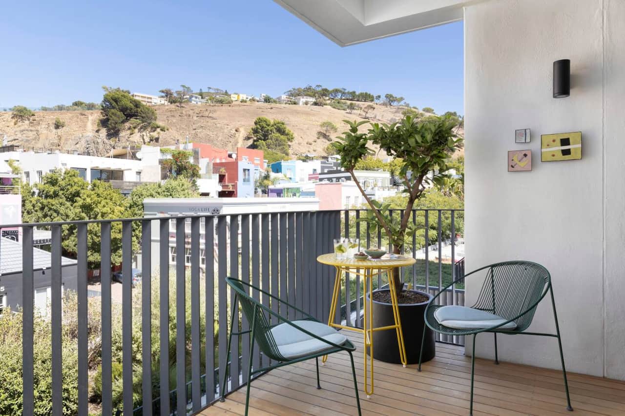 Enjoy the warm afternoon sun with cafe seating by Haldane Martin