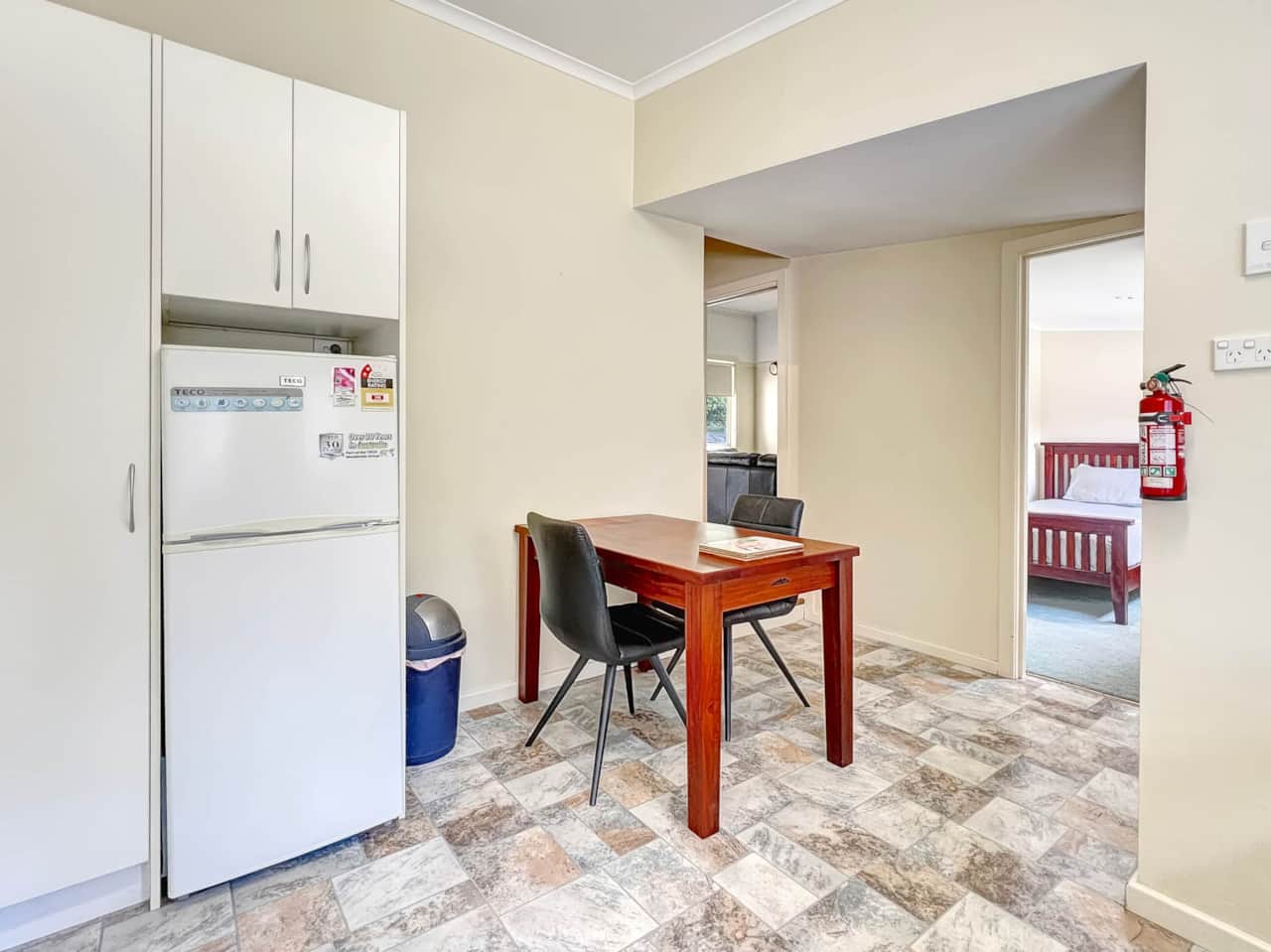 Adjacent to the kitchen, our dining area provides a seamless space for delightful meals.