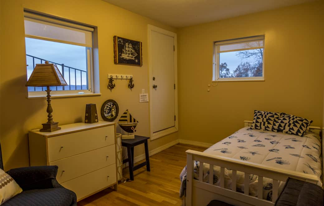 Bedroom #4 is upstairs and has a twin sized daybed with a trundle bed underneath.