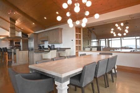 Dining table comfortably seats 10 guests. Additional seating on counter and bar stools