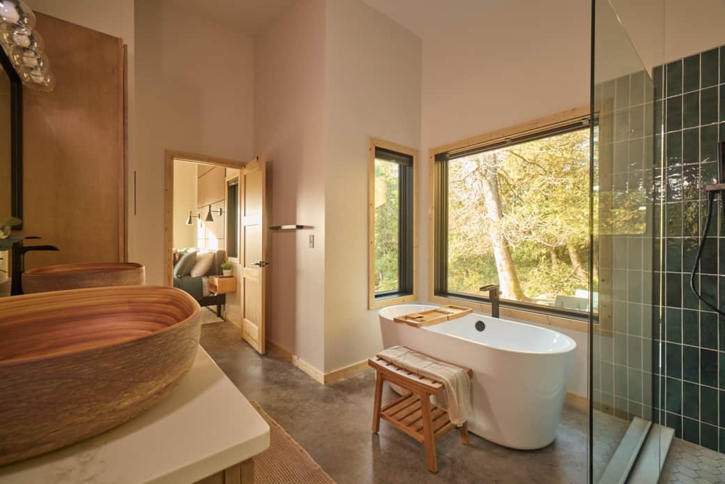 Main Bathroom with Soaking Tub and Forest Views