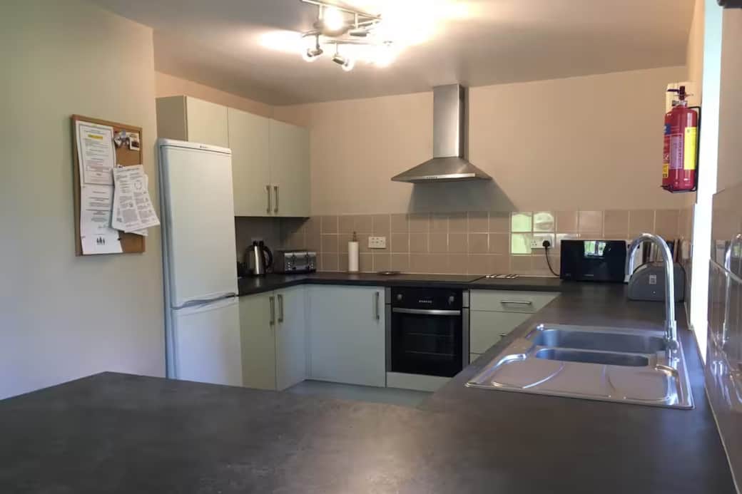 Modern kitchen, fully kitted with dishwasher, washing machine, microwave, kettle and toaster. An ope Modern kitchen, fully kitted with dishwasher, washing machine, microwave, kettle and toaster. An ope