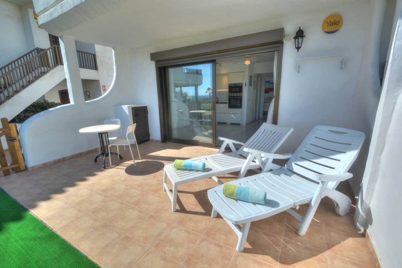 Outdoor area with sunbeds