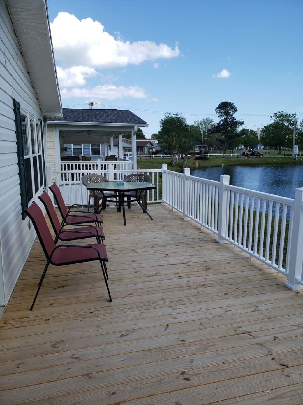 Deck has table and chairs