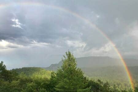 Summer rainbow from deck of Kite House