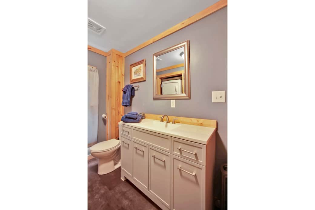 First Level Bathroom, tub/shower combo with washer and dryer