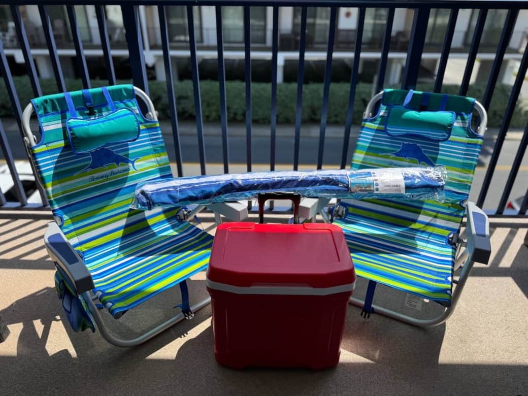 Free beach gear including two Tommy Bahamas chairs, a cooler with wheels and an umbrella. Free beach gear including two Tommy Bahamas chairs, a cooler with wheels and an umbrella.