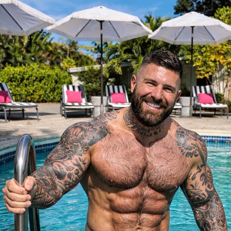 Naked Man Relaxing in the Heated Pool at Casa Citron – Clothing-Optional Guesthouse Fort Lauderdale