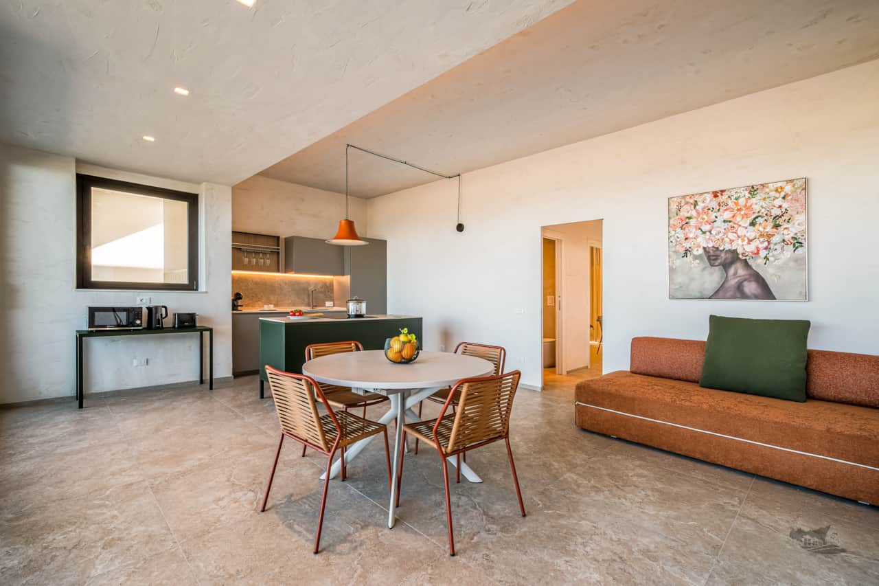 This bright and stylish living area offers a perfect blend of comfort and elegance.
