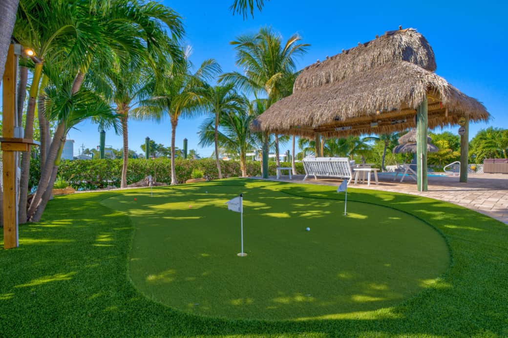 Putting green by tiki hut 1