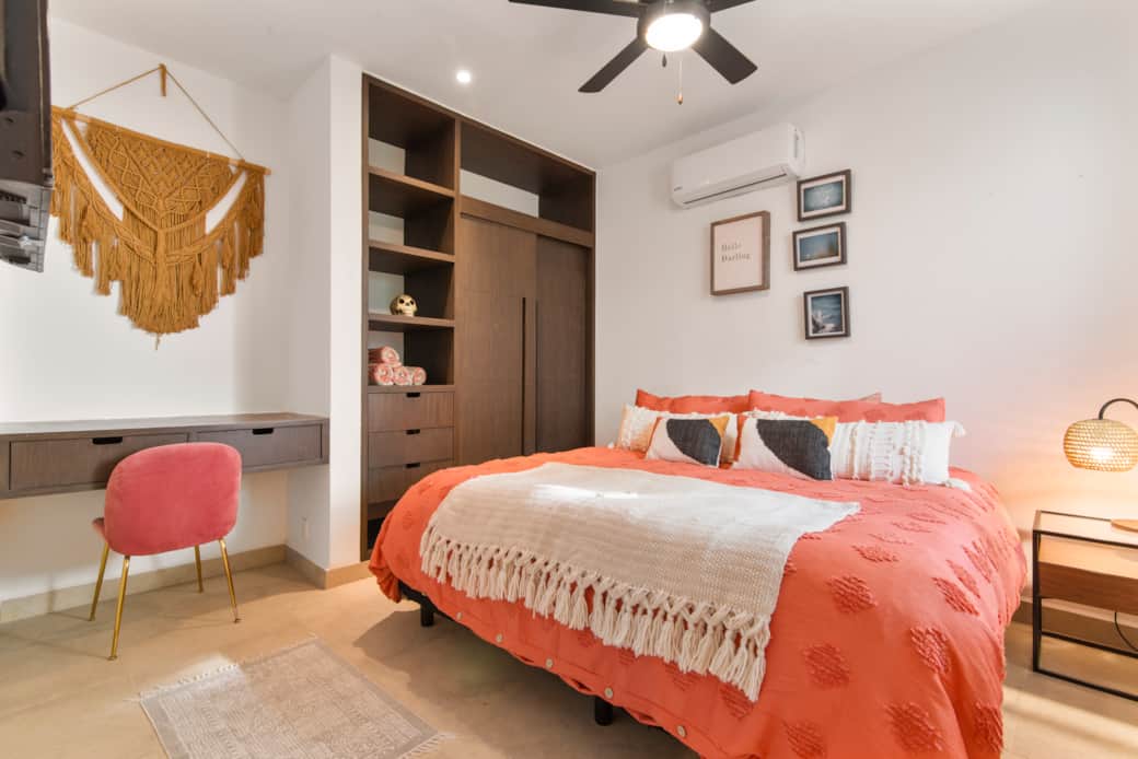 Relax in comfort with a king bed, soft linens, smart TV, AC, ceiling fan & workspace.