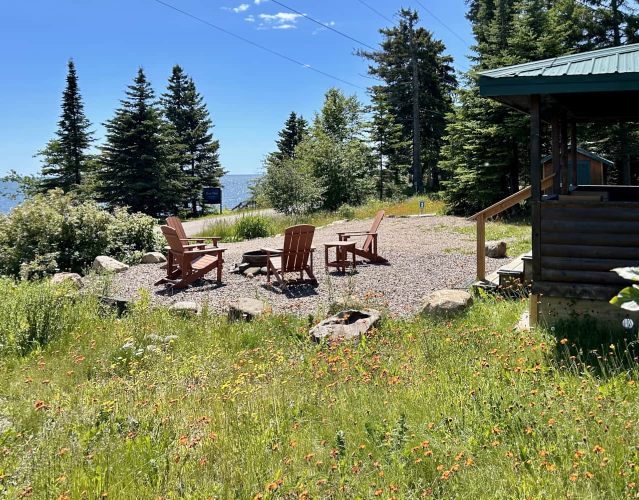 Gorgeous Lake views from your private firepit. Note Eve's Place sign and stairs to beach in distance