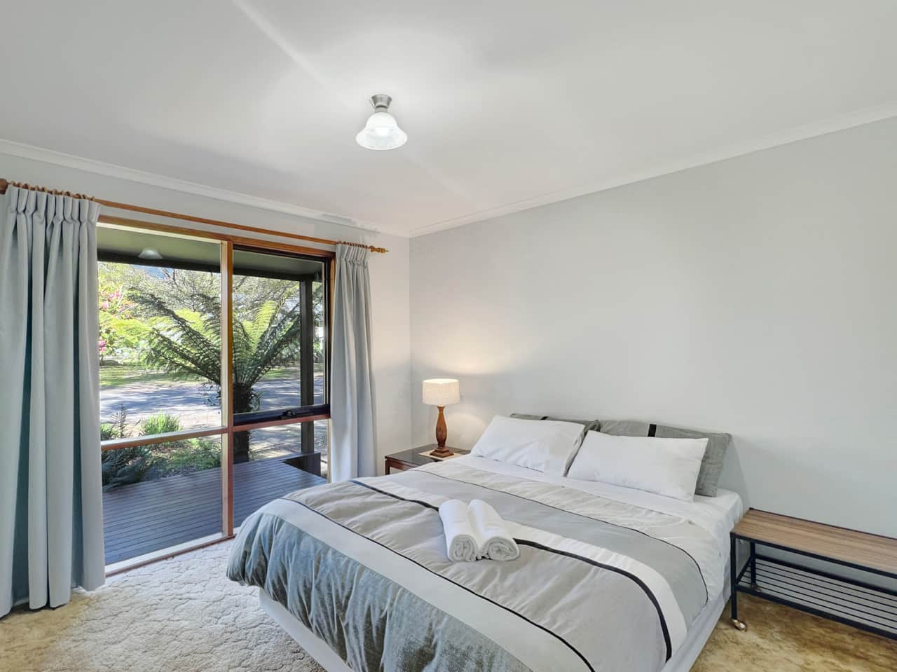 Bedroom 2: Comfort and elegance with luxurious queen bed.