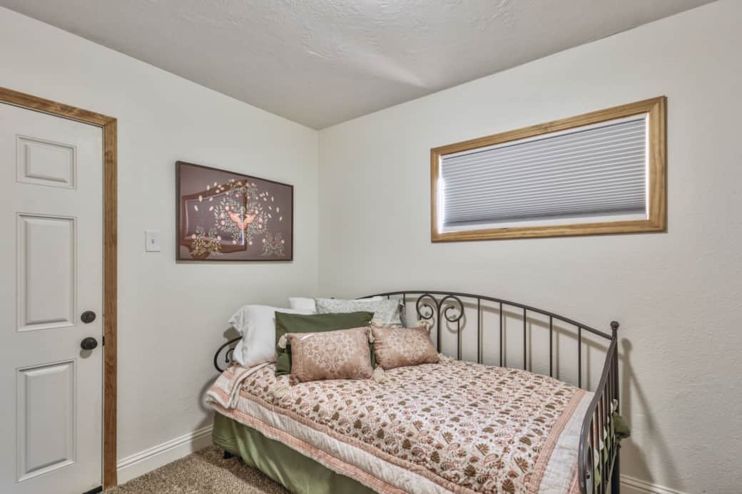 Guest bedroom at end of hall with twin trundle bed Guest bedroom at end of hall with twin trundle bed