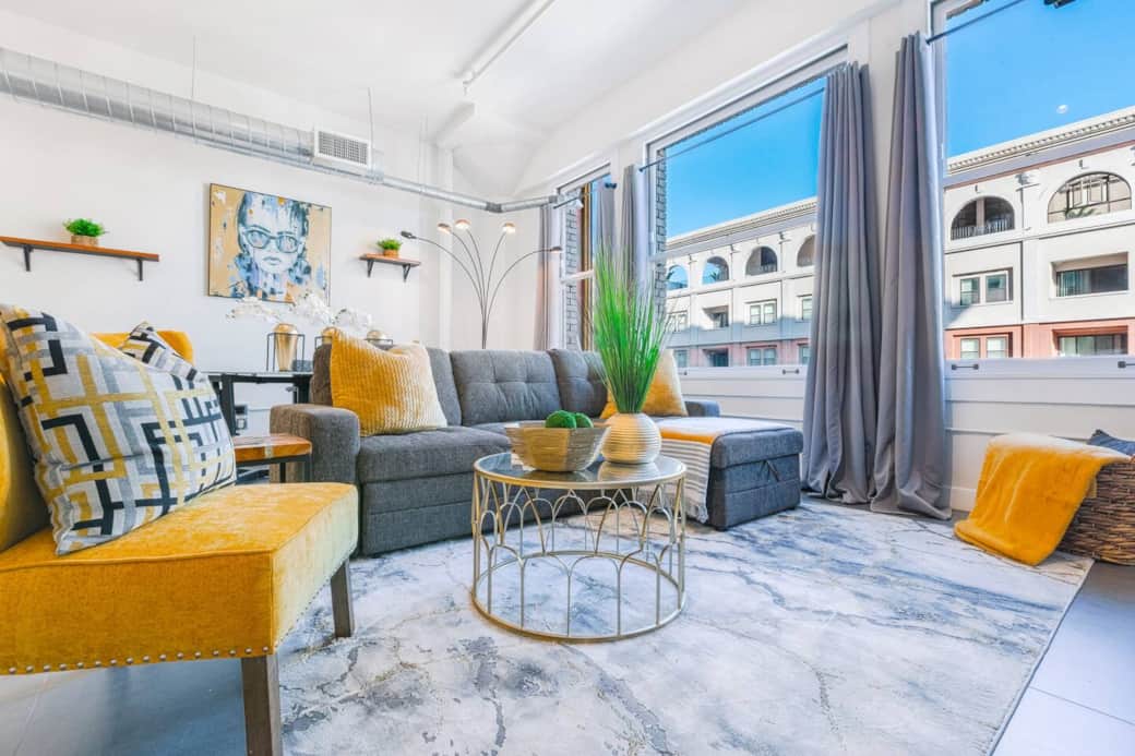 Serene living room filled with abundant natural light, creating a calming and refreshing atmosphere.
