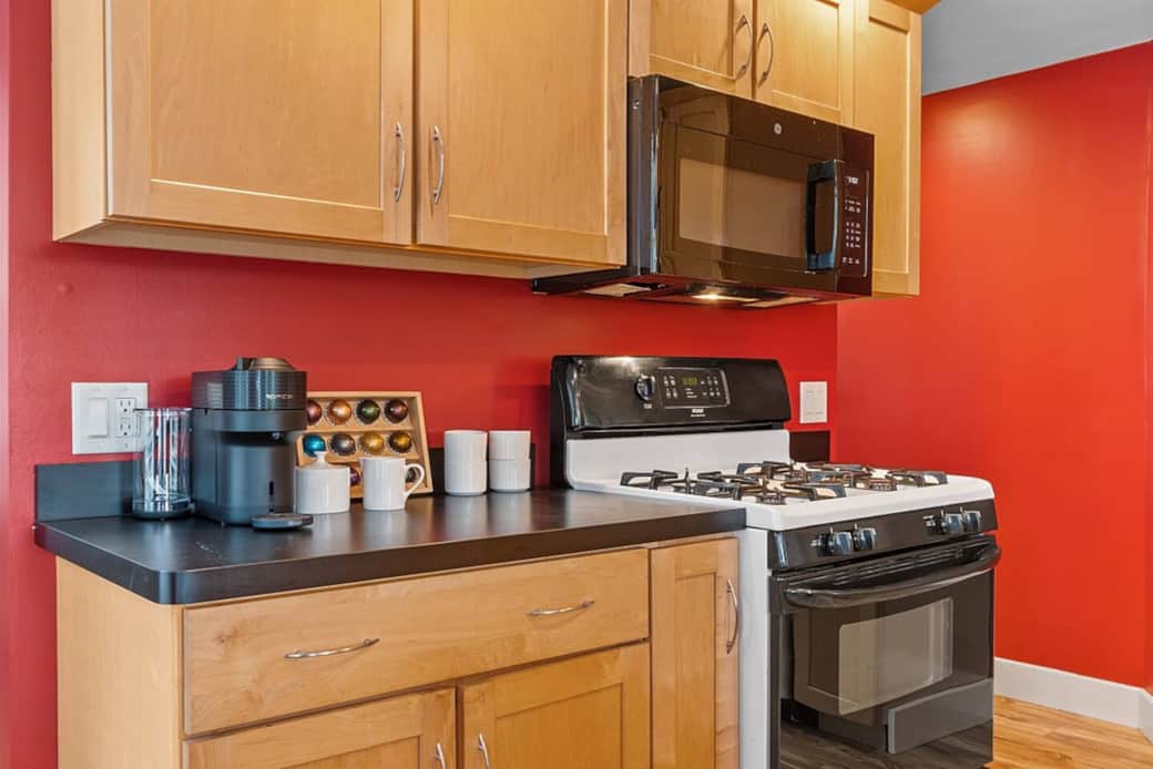 N'espresso coffee maker and coffee bar to start your day off right! Gas range and microwave.