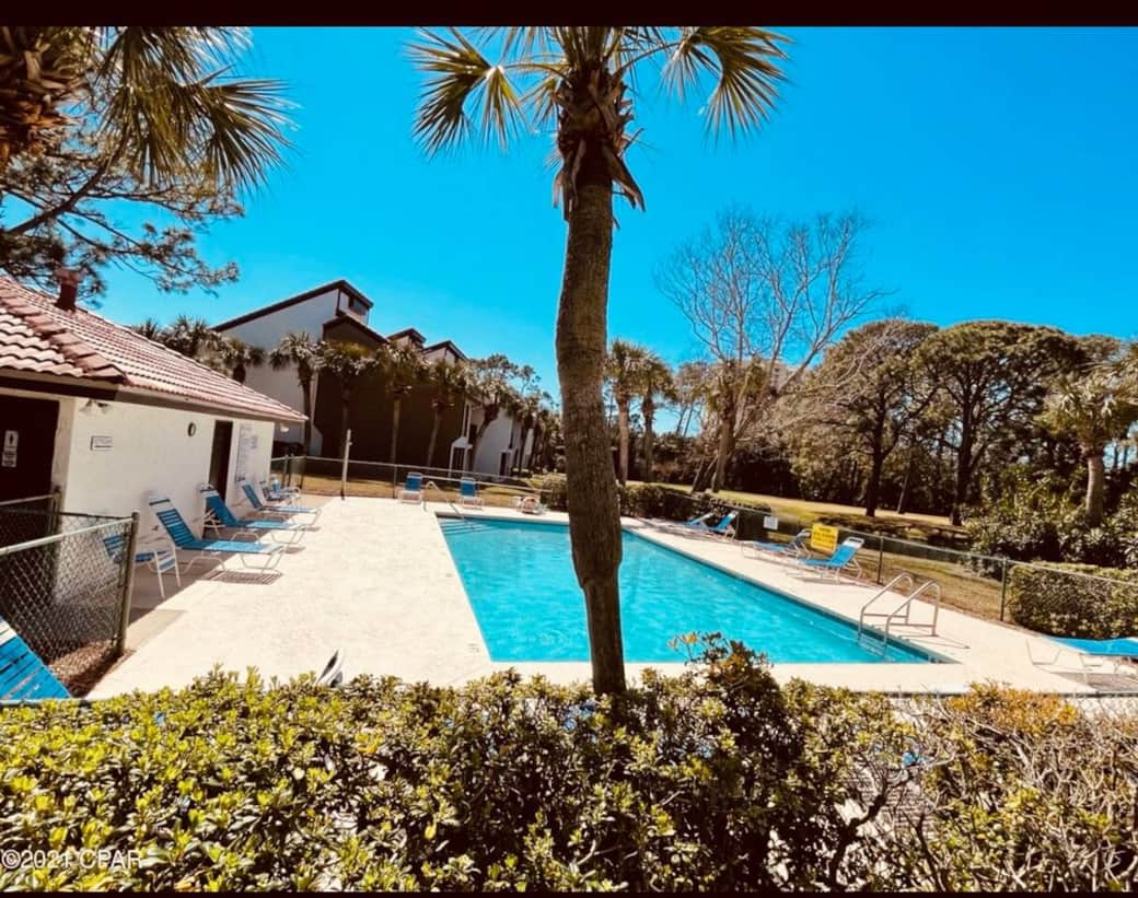 The pool is located right outside your condo.