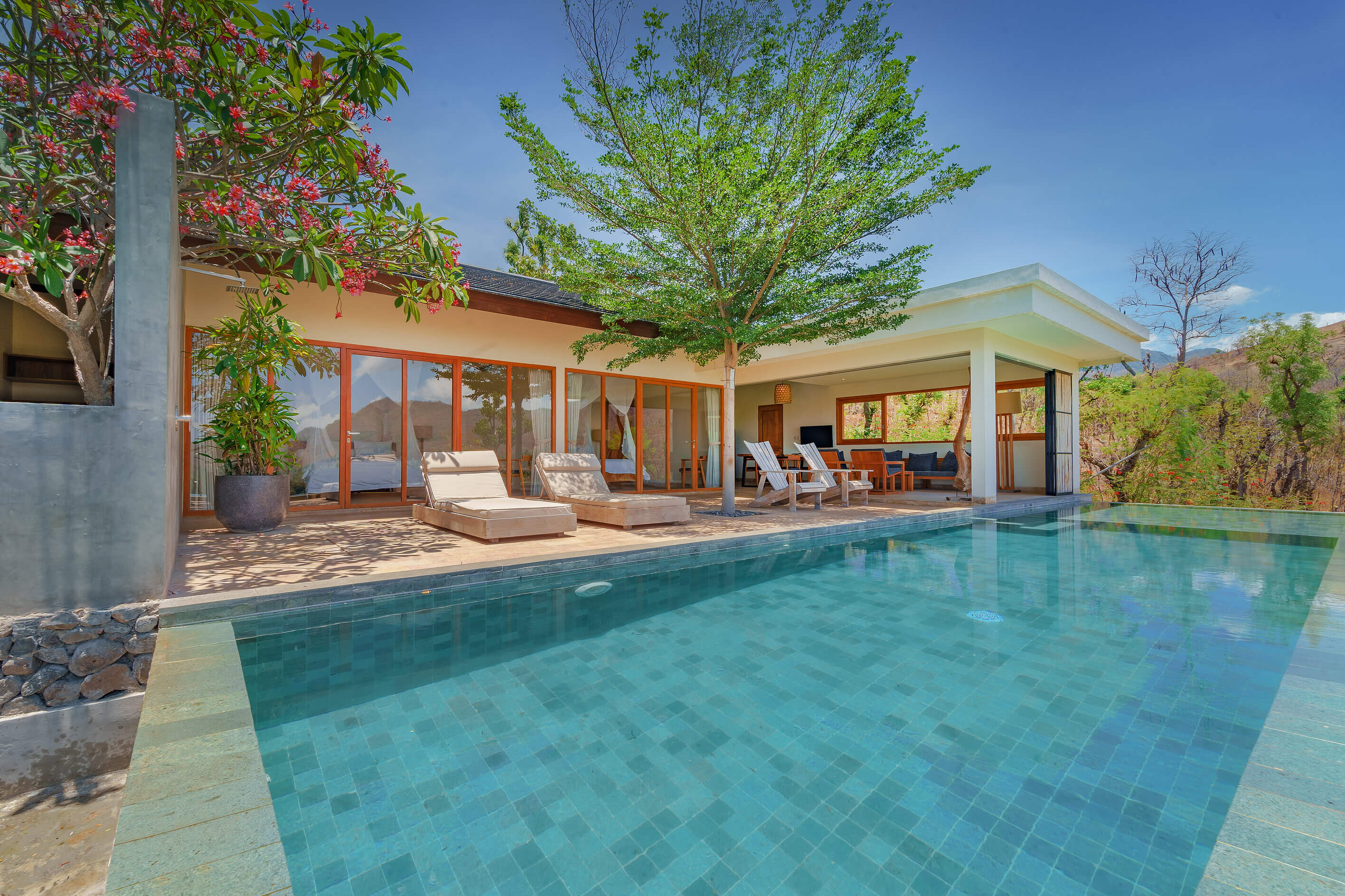 Exterior view of Villa Katak with lush tropical surroundings