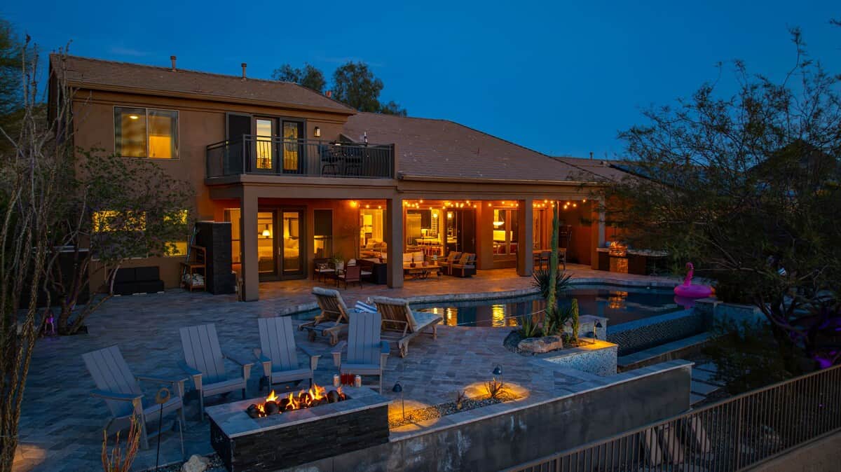 Exterior and backyard at dusk.

Photo by Bear Lens Media | https://www.bearlens.com
