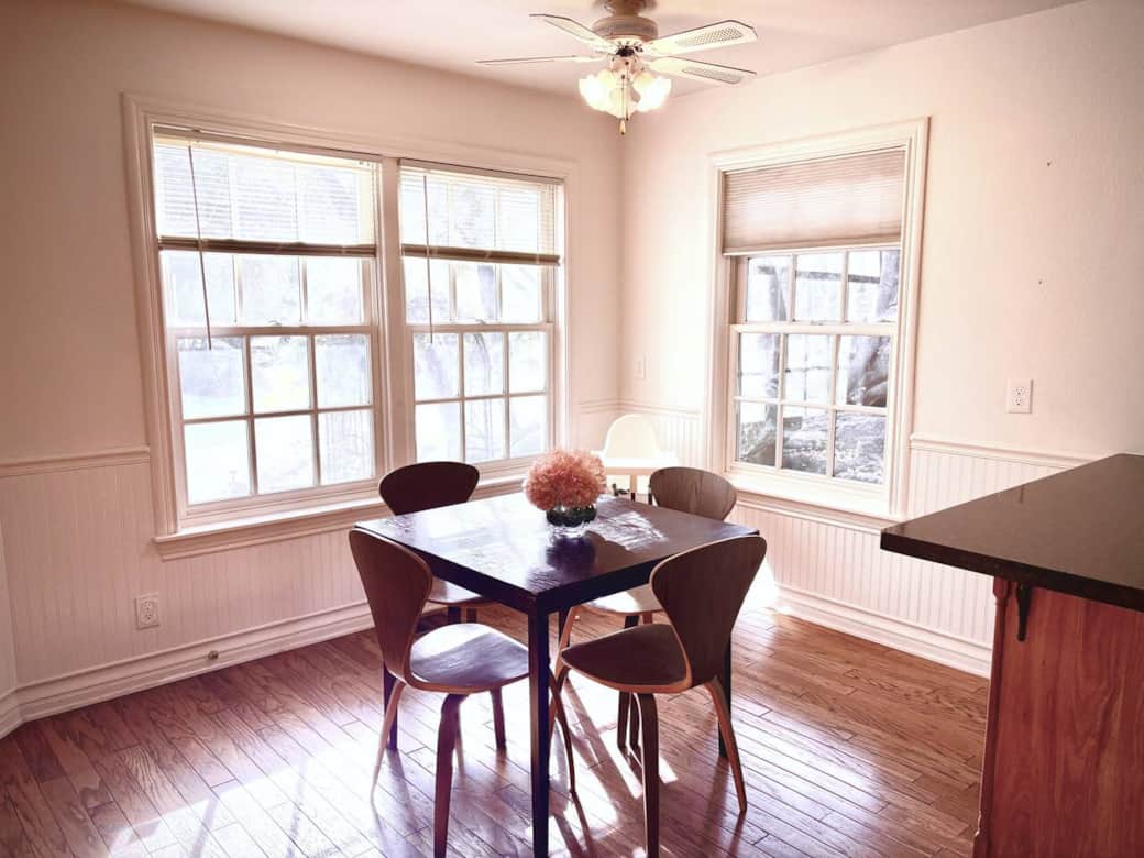 Enjoy morning coffee, casual meals, or conversation in this cozy breakfast nook surrounded by mountain cabin charm.